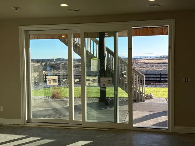 Walkout basement with sliding glass doors to the patio