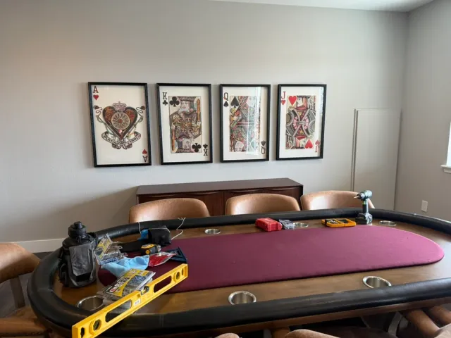 Finished basement game room with a poker table